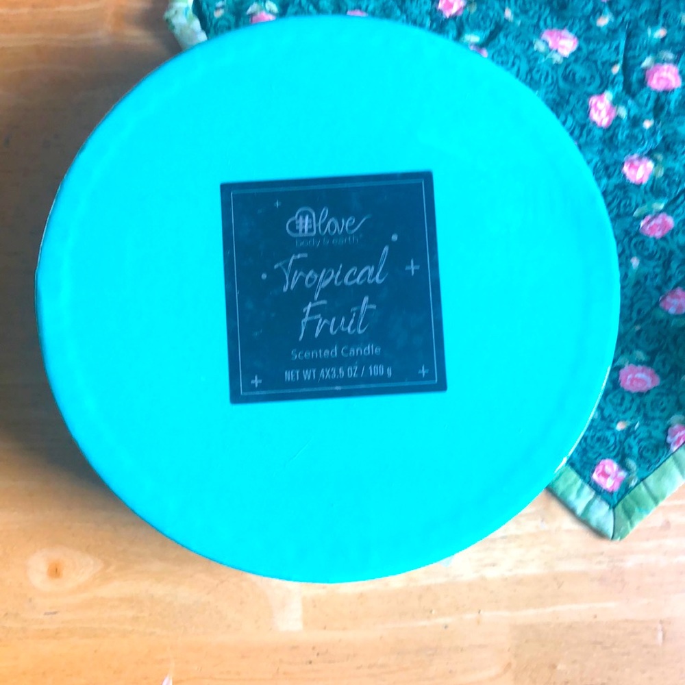 Brand new/ unopened box with scented candle by Body & Earth